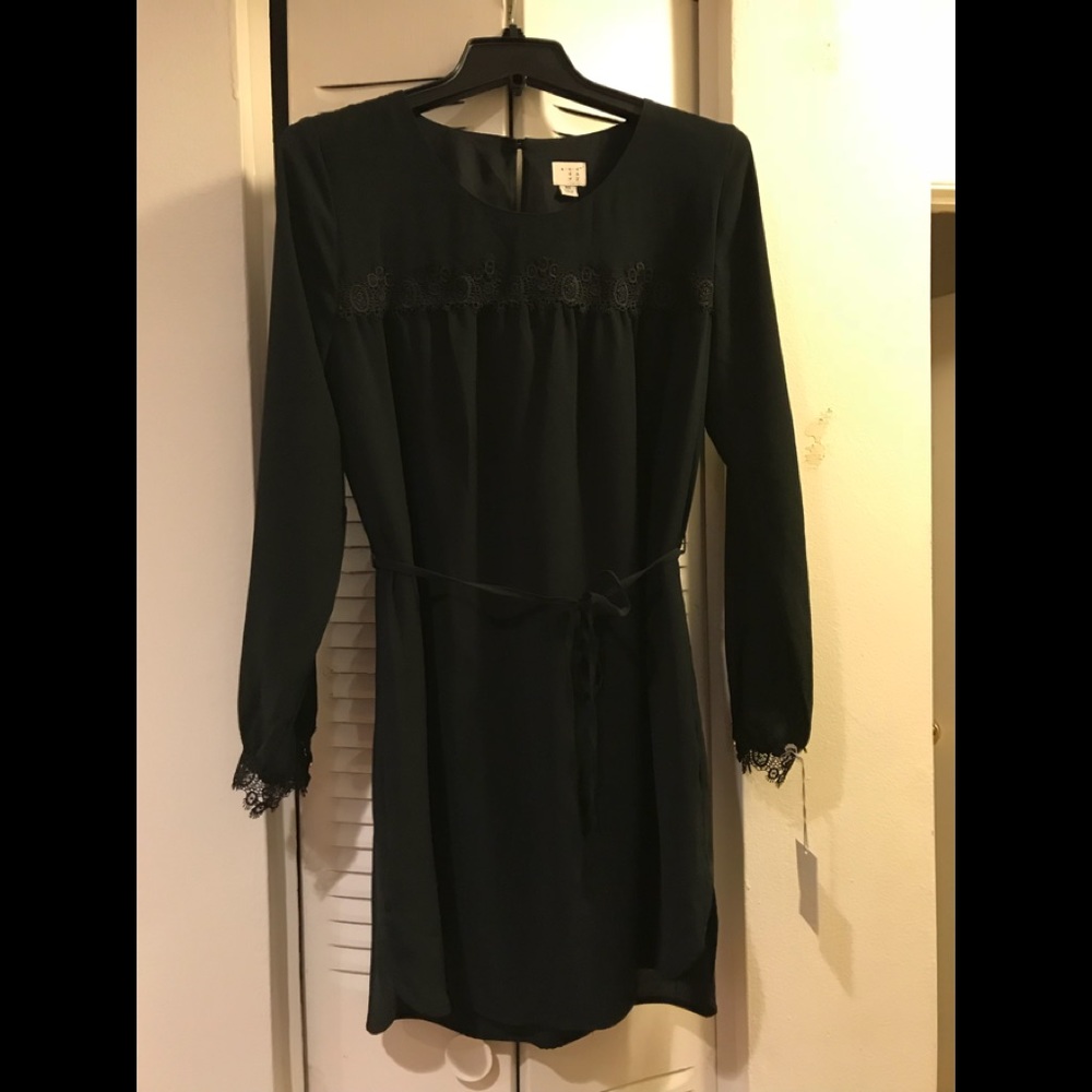 Black shift dress with lace neck and tie belt